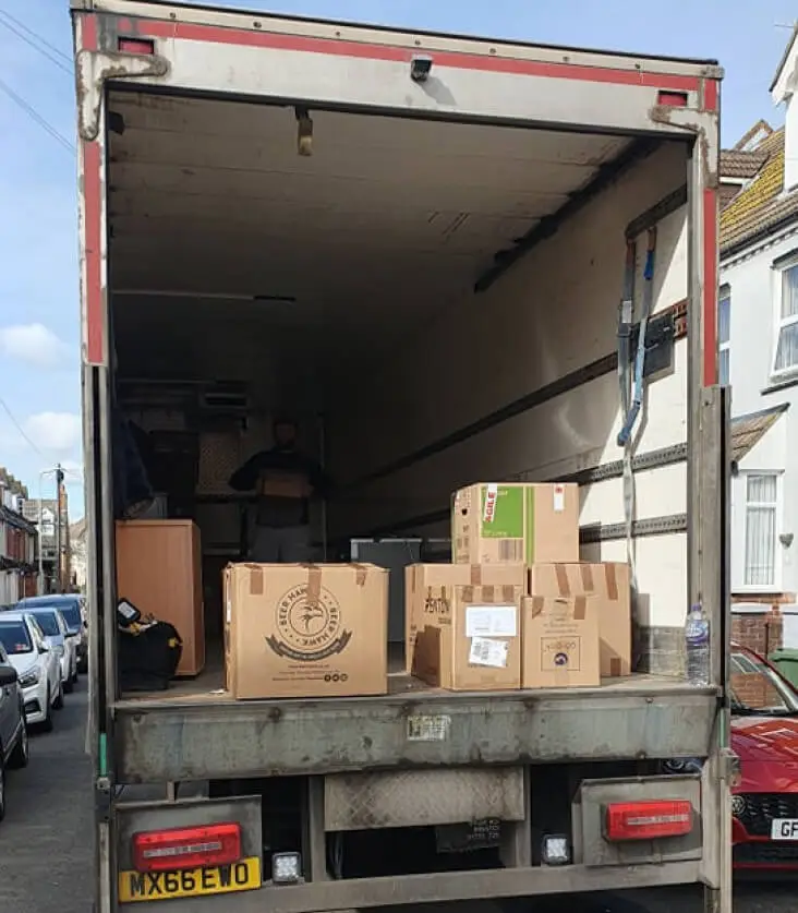 a van being loaded for a long distance move
