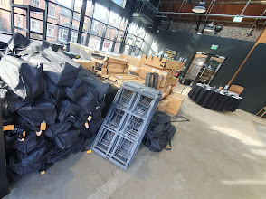 Commercial office relocation in progress — wrapped furniture ready for transit